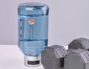 Blue water bottle with a logo and two gray dumbbells on a light background