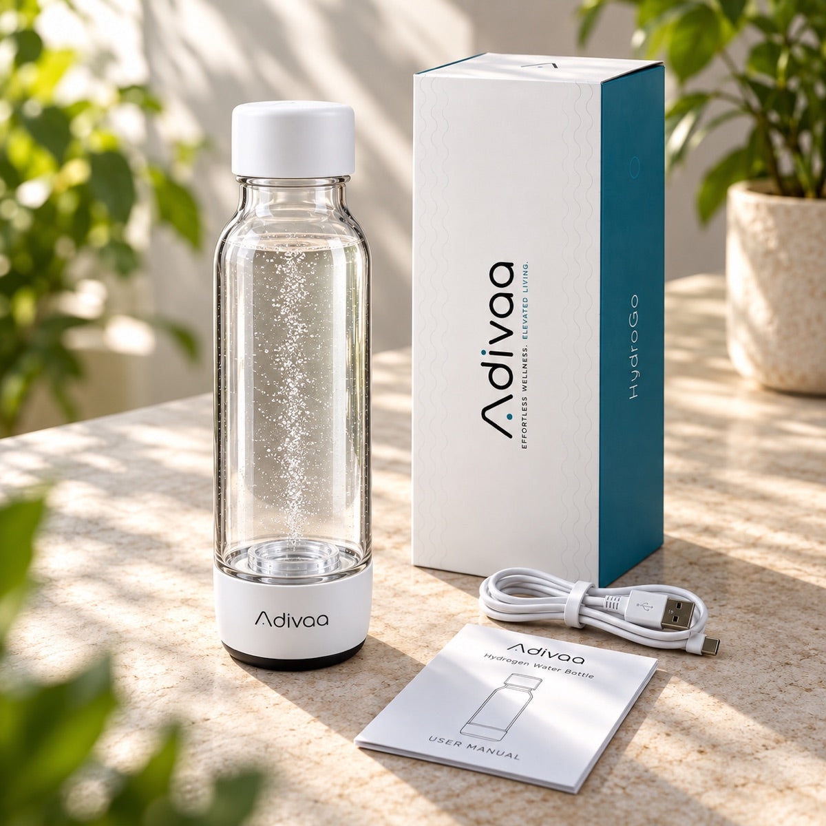 HydroGo beside its box, with the USB-C cable and the user manual