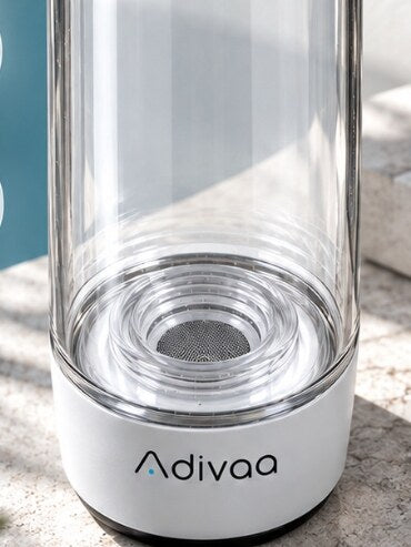 The HydroGo base on a stone ledge, the generator visible through the clear body