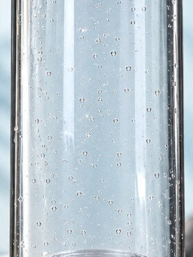 Fine hydrogen bubbles rising through the water inside HydroGo
