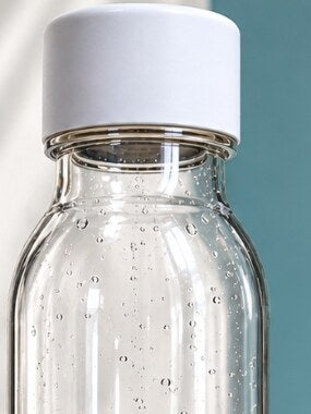 The white cap and shoulder of HydroGo, bubbles in the water