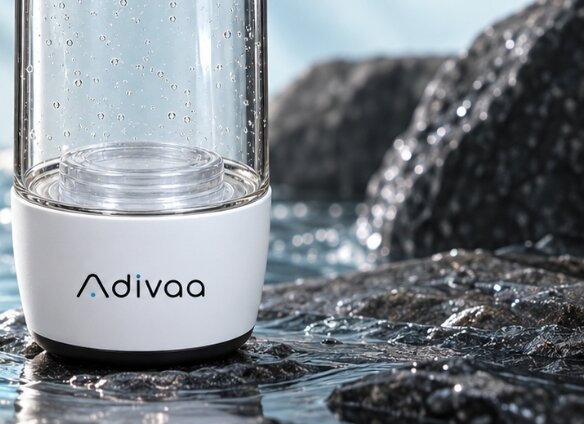 The base of HydroGo standing in shallow water on a dark rock