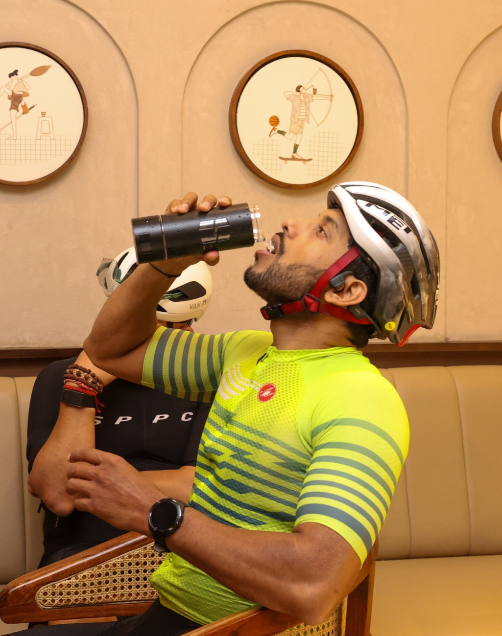 Cyclist drinking hydrogen water from the HydroMax bottle