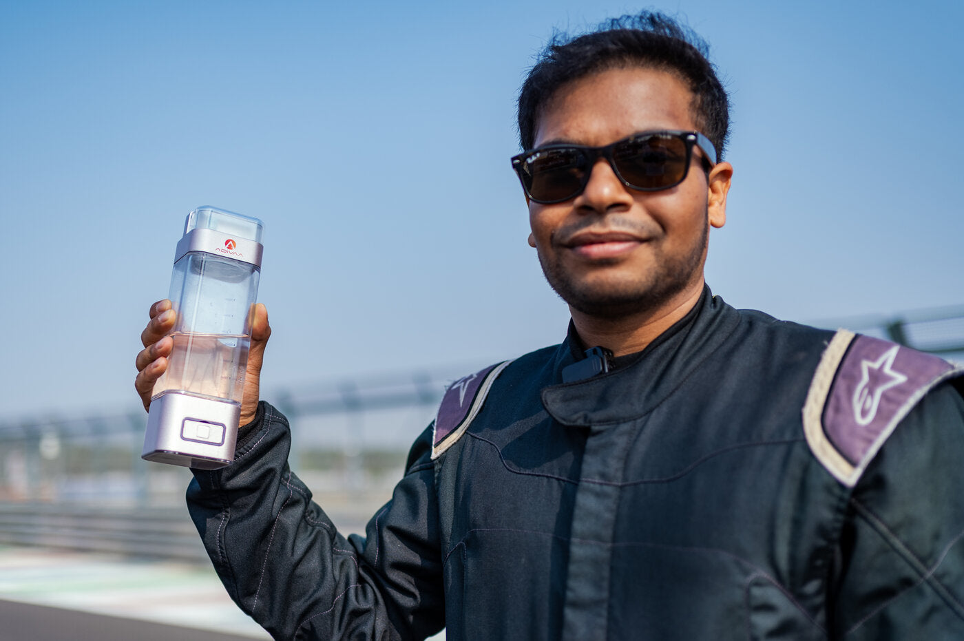 A racing driver with the HydroUltra at the circuit